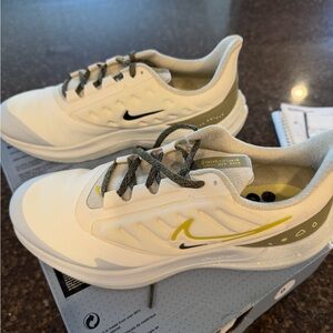 Nike Women’s White and Olive Green Running Shoes. Brand New.  Never worn.